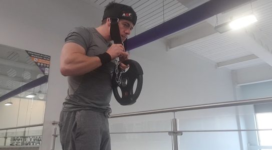 Neck training with harness